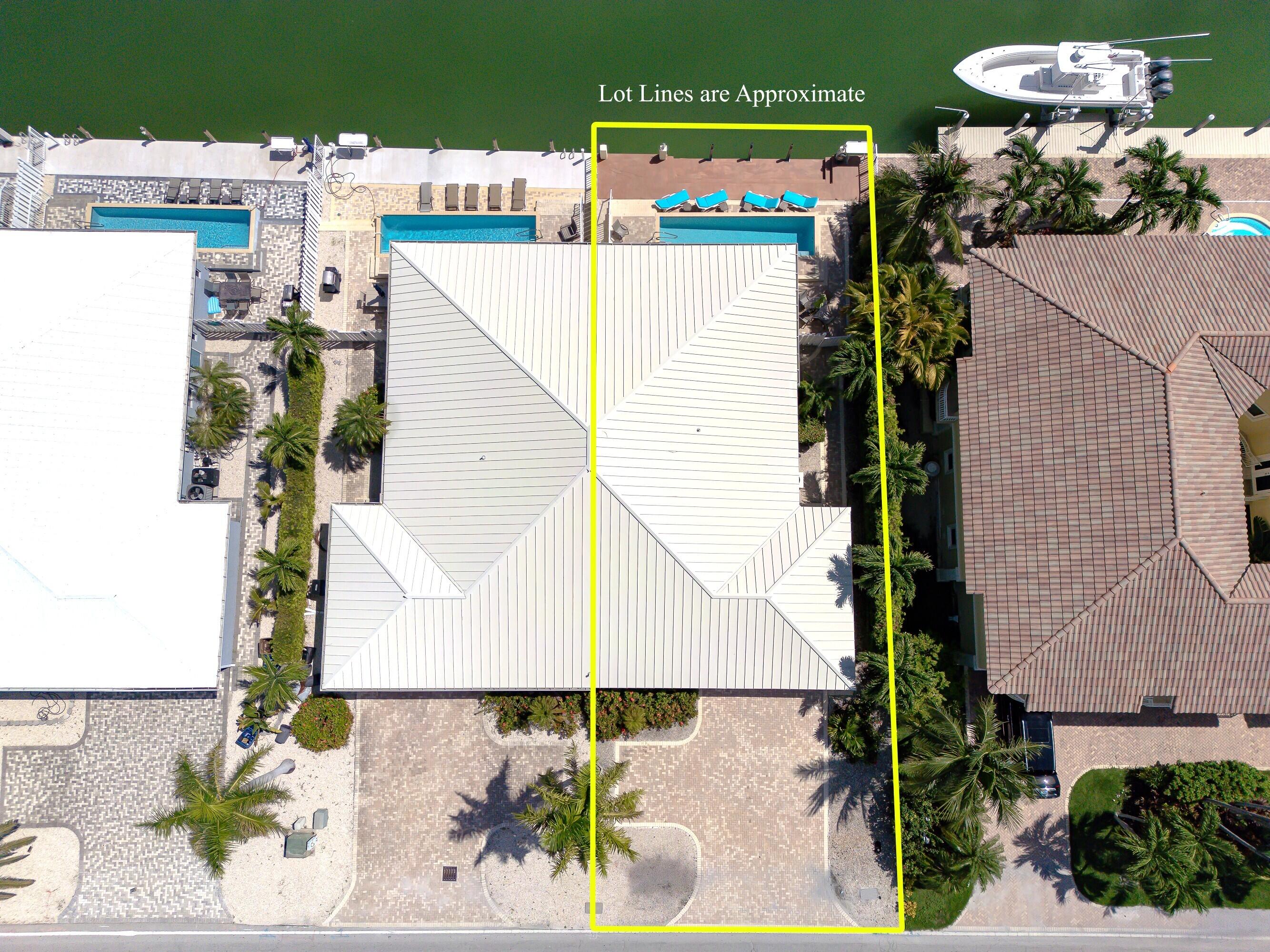 260 Sadowski Causeway Key Colony Beach, FL 33051 - Photo 32 of 50 an aerial view of a house with a yard