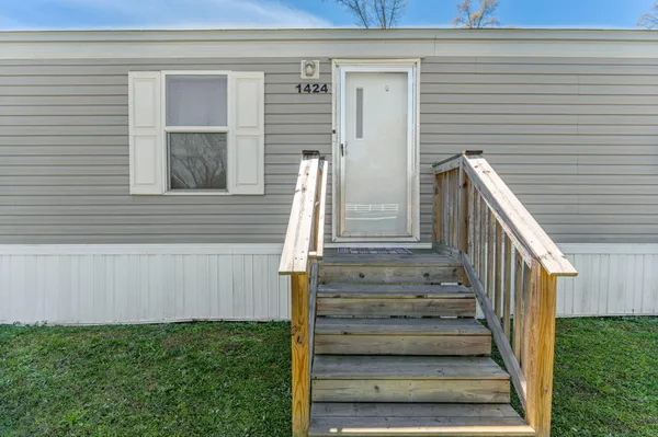 a view of entryway with a front door