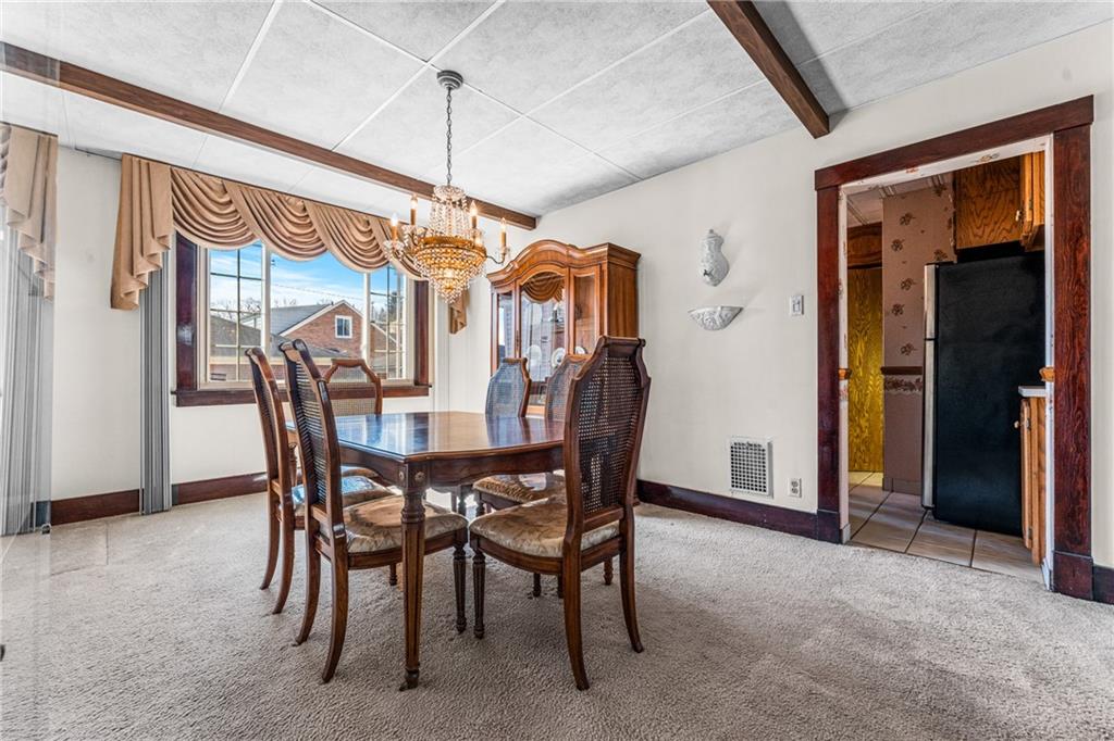 111 Sarah Street McKees Rocks, PA 15136 - Photo 11 of 30 a dining room with furniture and window