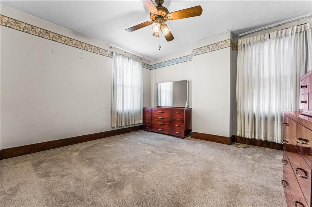 111 Sarah Street McKees Rocks, PA 15136 - Photo 16 of 30 a view of an empty room with a window