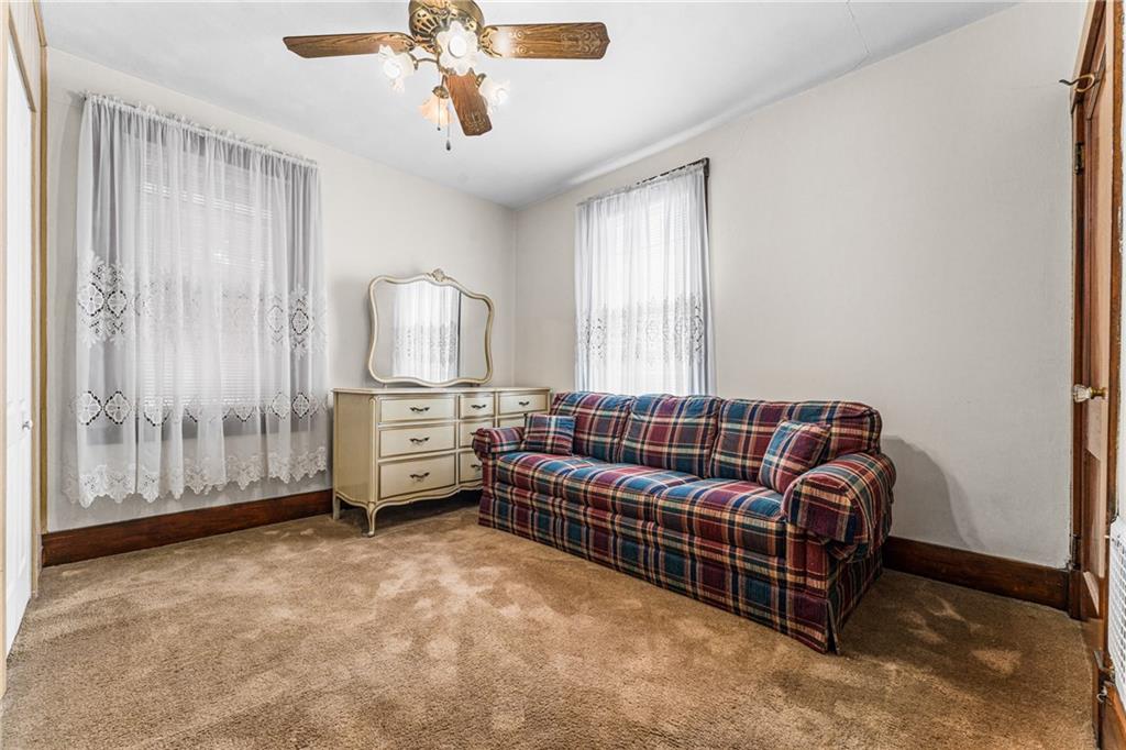 111 Sarah Street McKees Rocks, PA 15136 - Photo 3 of 30 a bedroom with furniture and a window