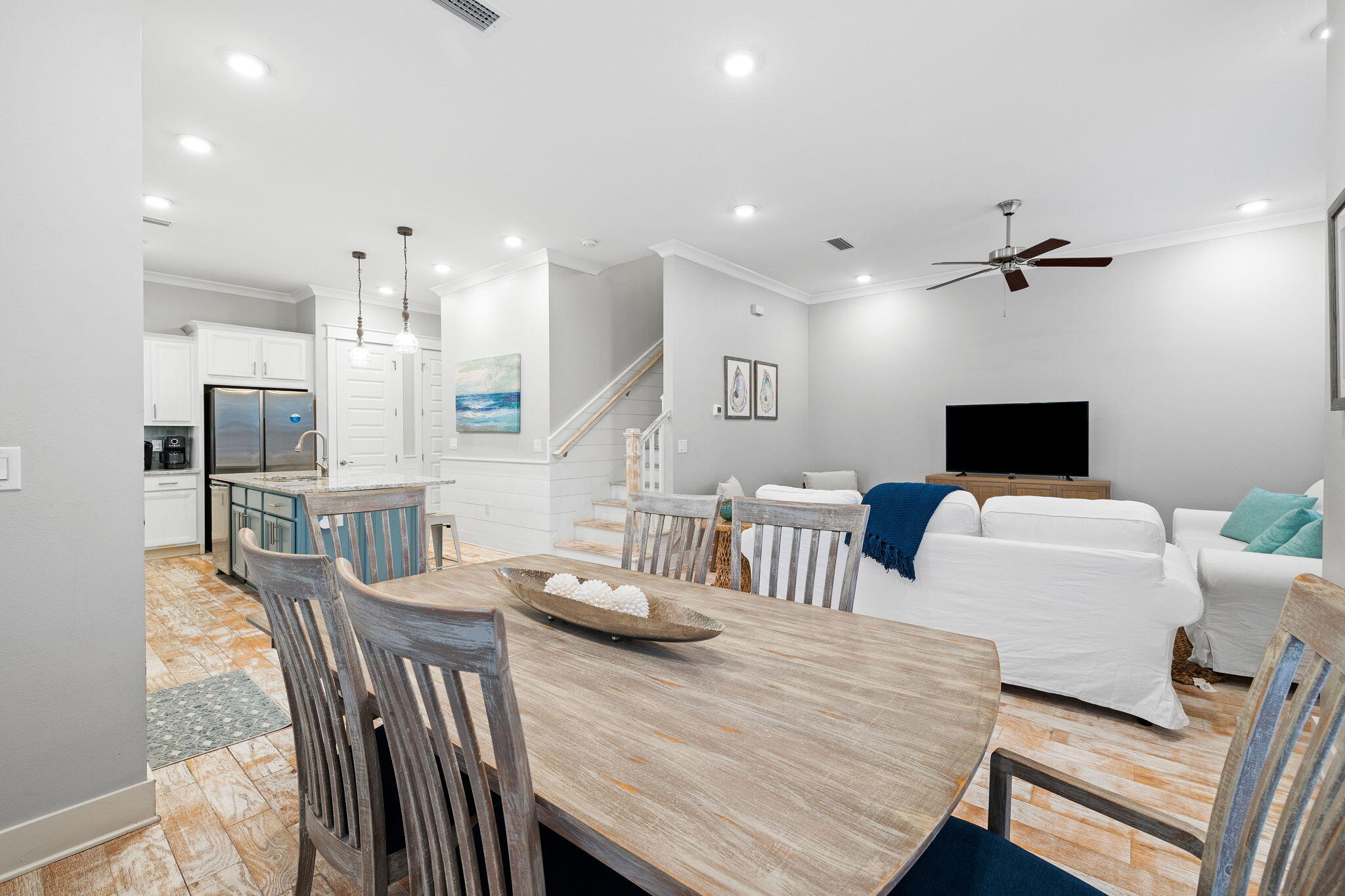 223 Milestone Dr Inlet Beach, Unit B Inlet Beach, FL 32461 - Photo 12 of 58 a living room with furniture a flat screen tv and a table