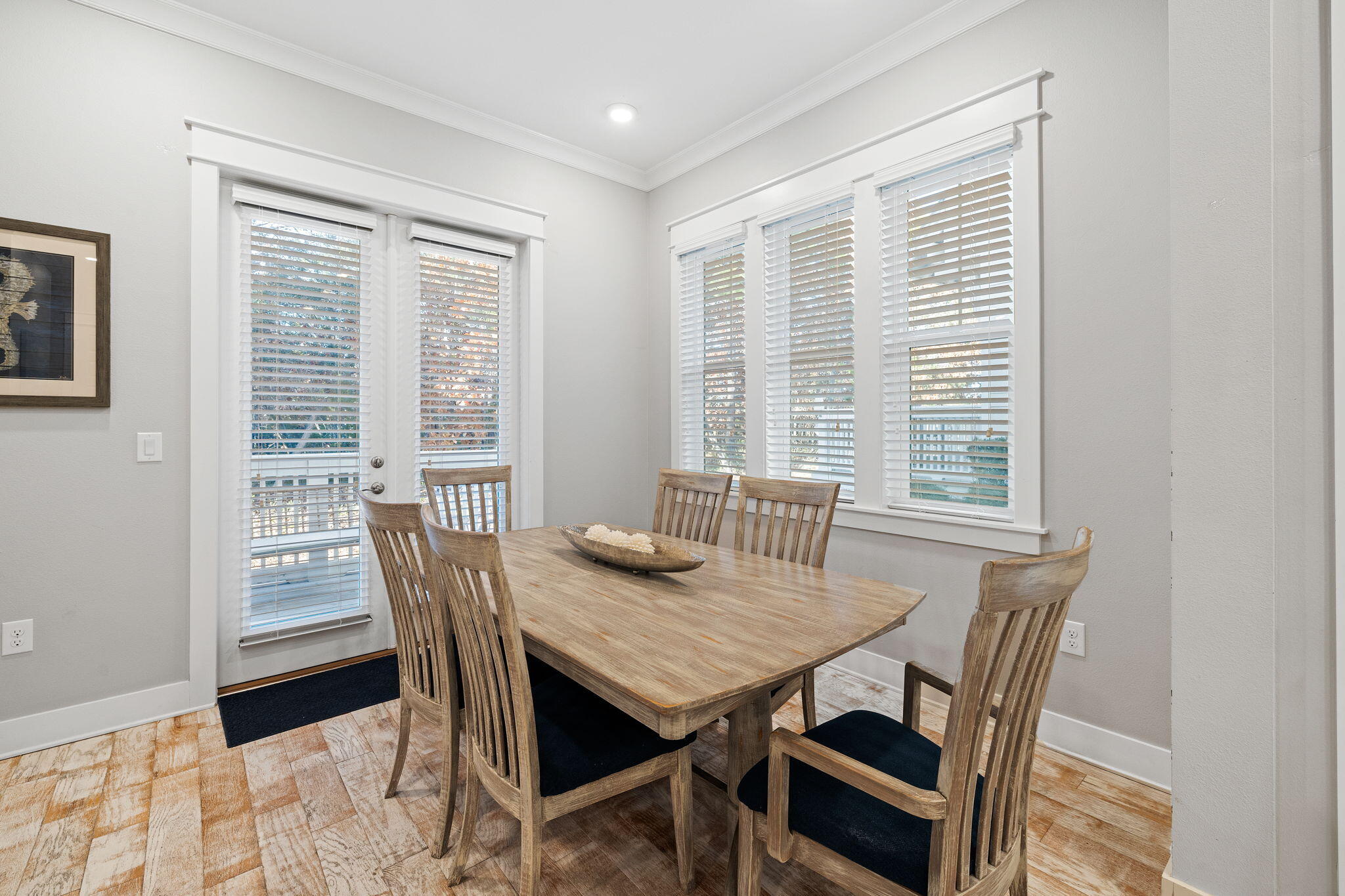 223 Milestone Dr Inlet Beach, Unit B Inlet Beach, FL 32461 - Photo 13 of 58 a view of a dining room with furniture and wooden floor