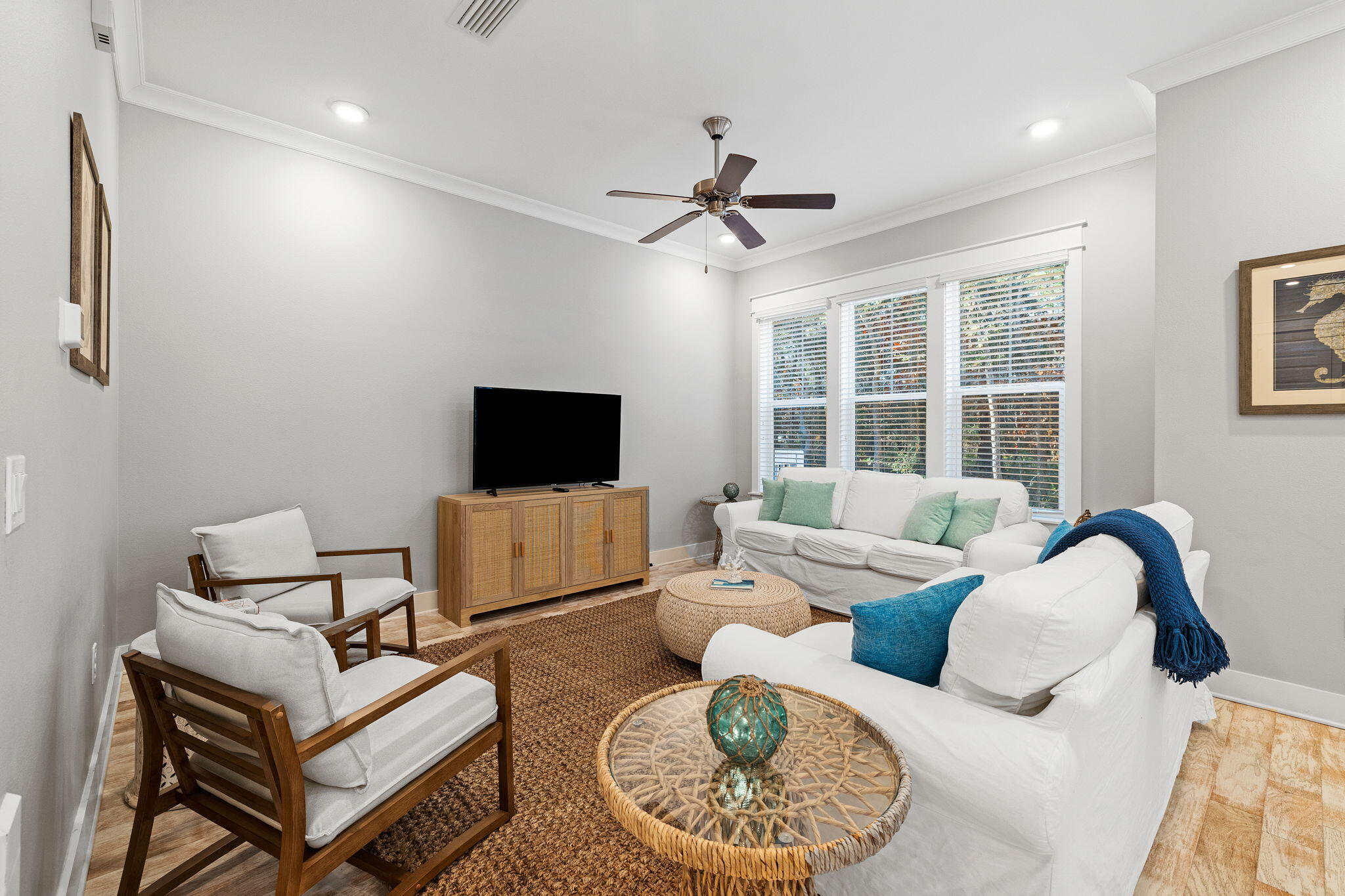 223 Milestone Dr Inlet Beach, Unit B Inlet Beach, FL 32461 - Photo 15 of 58 a living room with furniture and a flat screen tv