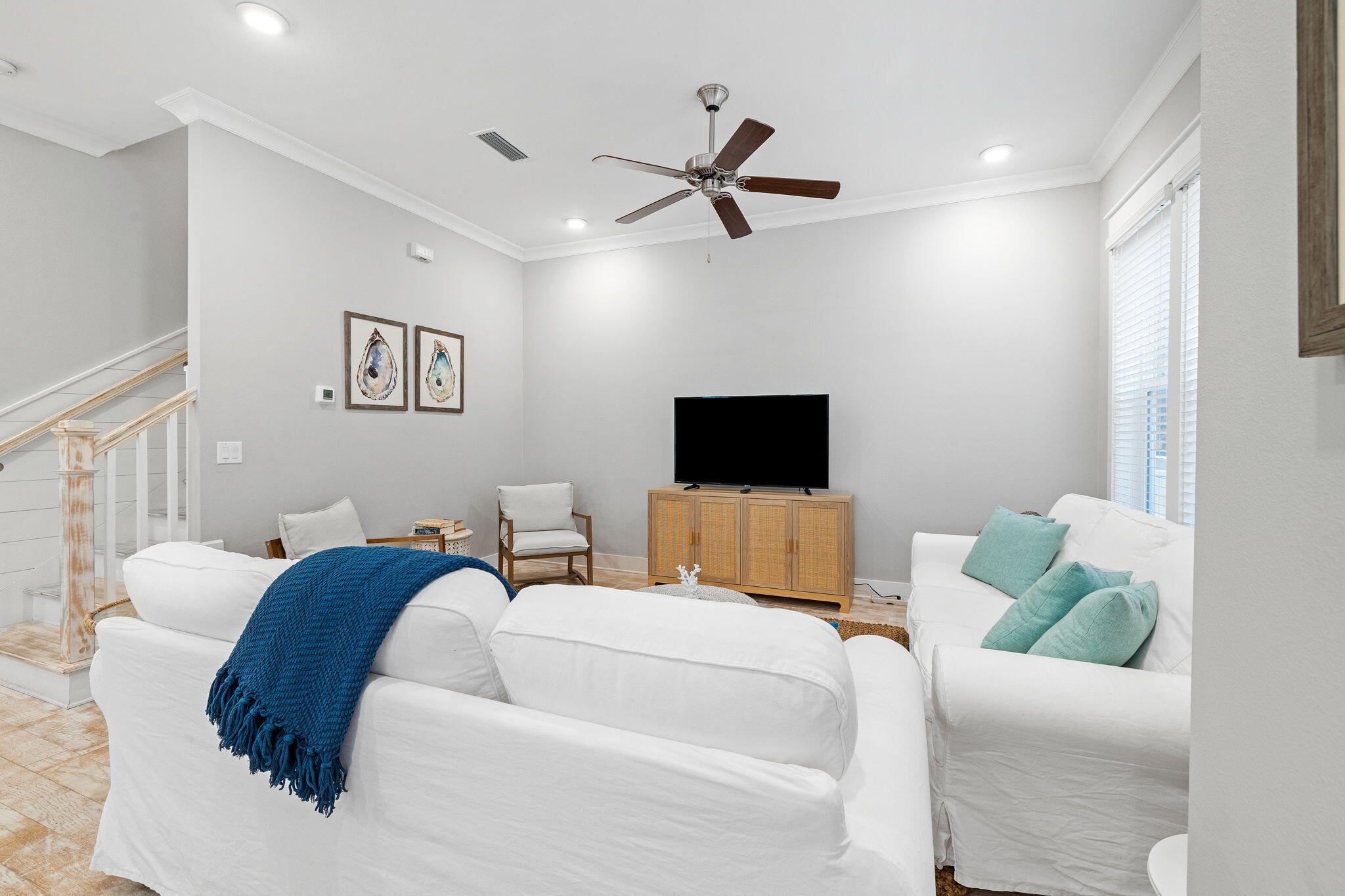 223 Milestone Dr Inlet Beach, Unit B Inlet Beach, FL 32461 - Photo 16 of 58 a living room with furniture and a flat screen tv