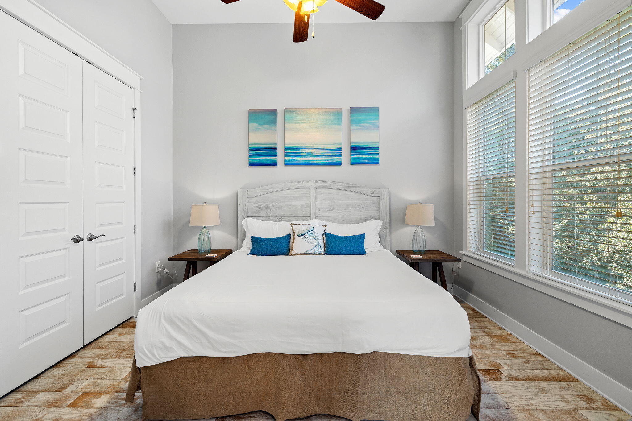 223 Milestone Dr Inlet Beach, Unit B Inlet Beach, FL 32461 - Photo 17 of 58 a bedroom with a bed and a painting on the wall