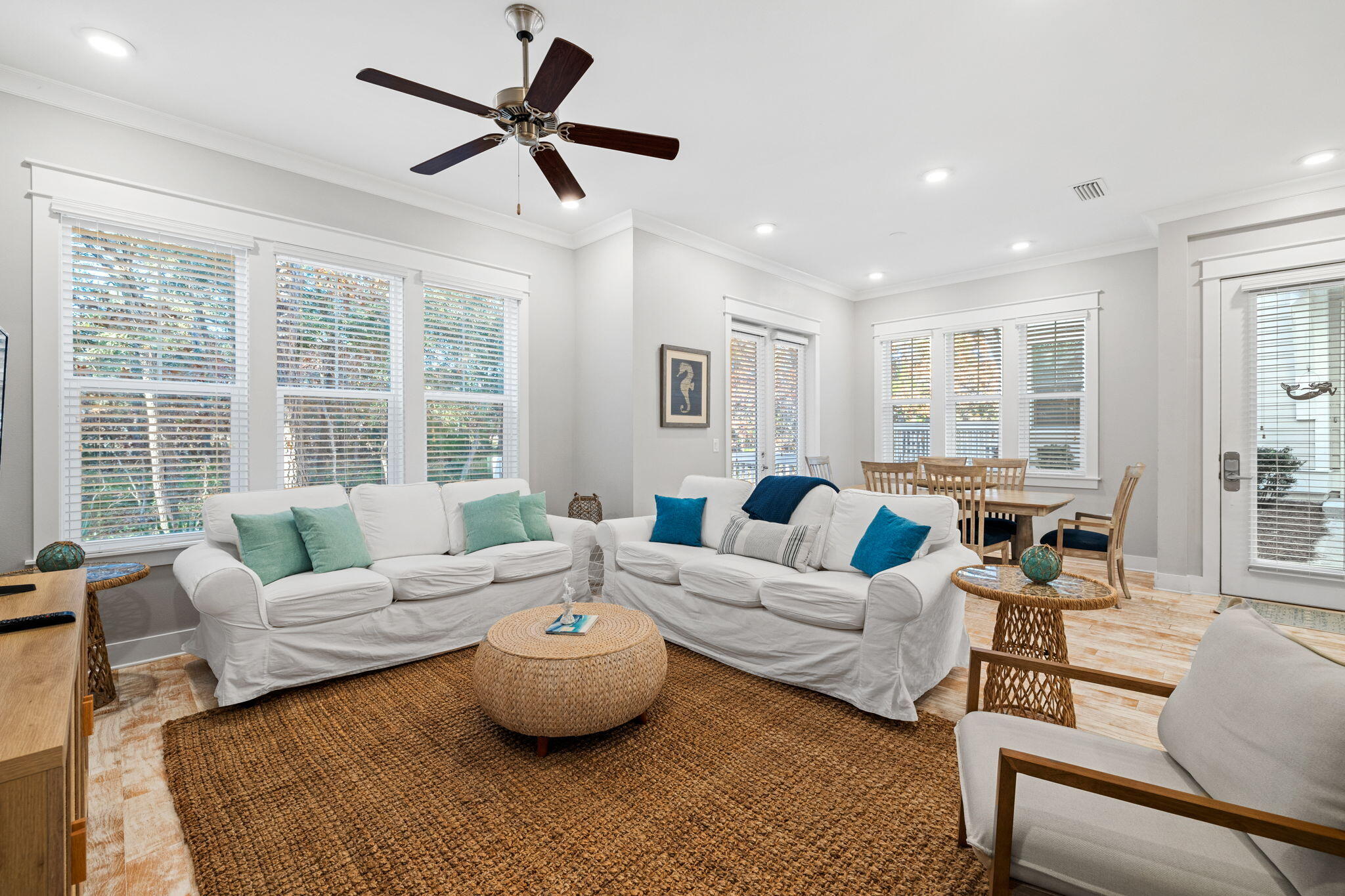 223 Milestone Dr Inlet Beach, Unit B Inlet Beach, FL 32461 - Photo 2 of 58 a living room with furniture and a large window