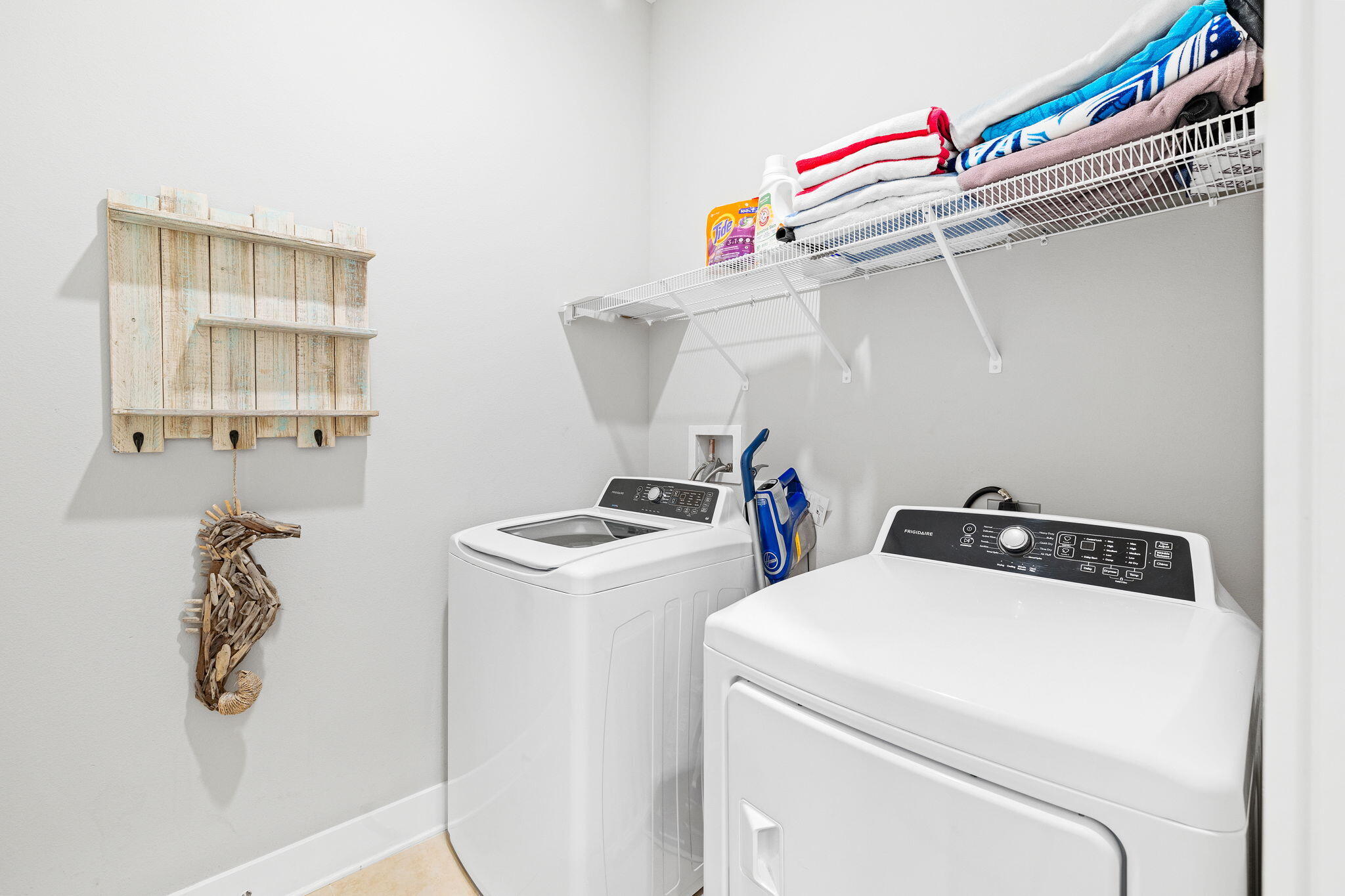 223 Milestone Dr Inlet Beach, Unit B Inlet Beach, FL 32461 - Photo 27 of 58 a utility room with dryer and washer