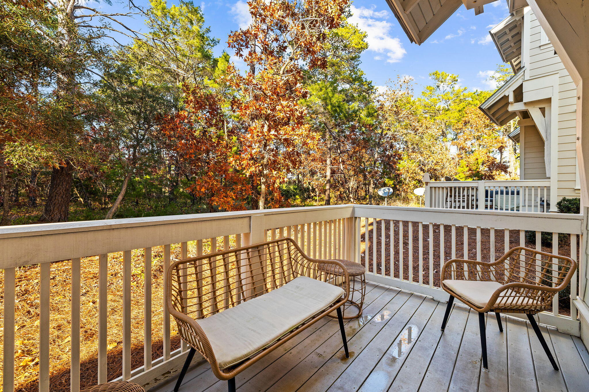 223 Milestone Dr Inlet Beach, Unit B Inlet Beach, FL 32461 - Photo 32 of 58 a view of a two chairs in the deck