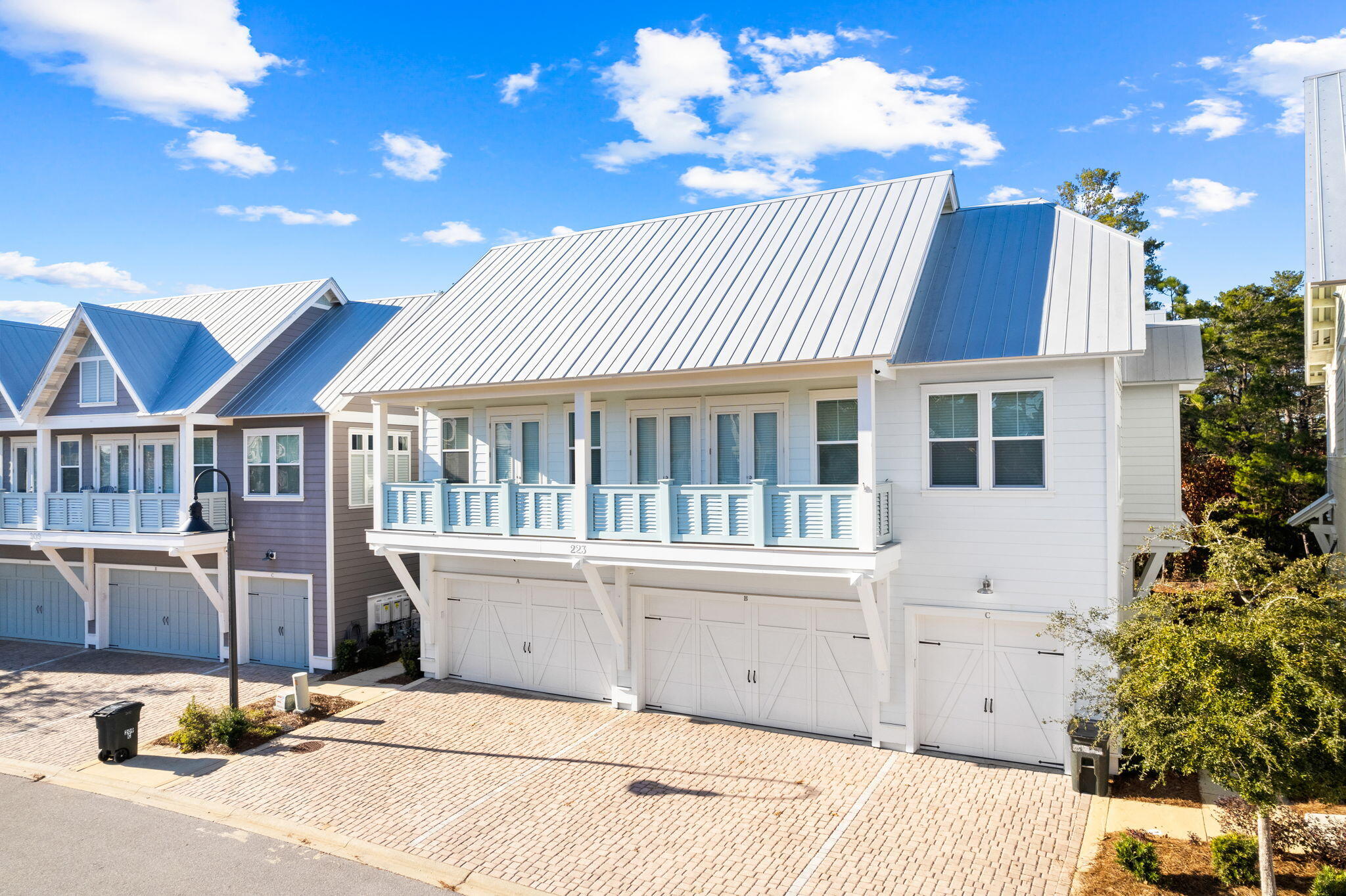 223 Milestone Dr Inlet Beach, Unit B Inlet Beach, FL 32461 - Photo 43 of 58 a front view of a house with a garden