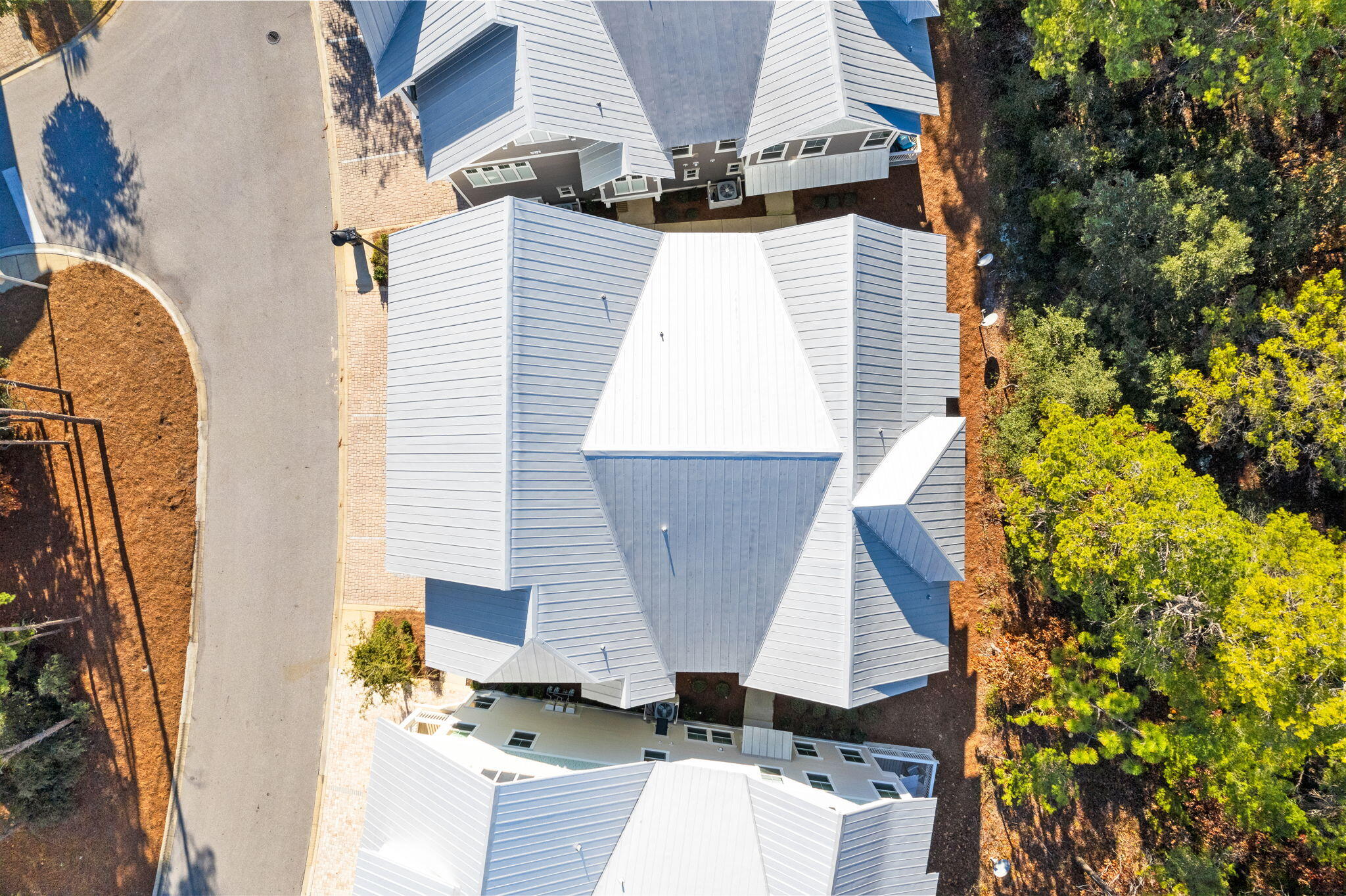 223 Milestone Dr Inlet Beach, Unit B Inlet Beach, FL 32461 - Photo 47 of 58 an aerial view of residential houses with wooden stairs