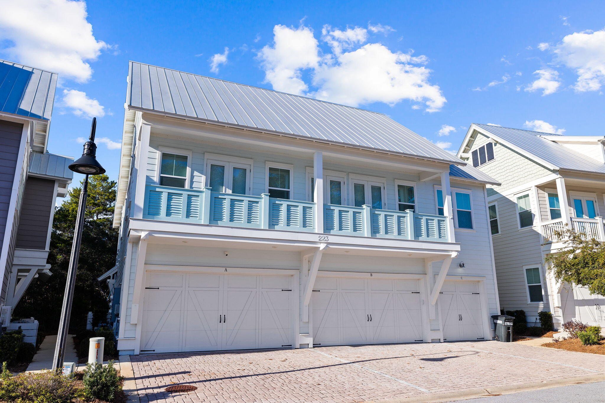 223 Milestone Dr Inlet Beach, Unit B Inlet Beach, FL 32461 - Photo 48 of 58 a view of a building with a street