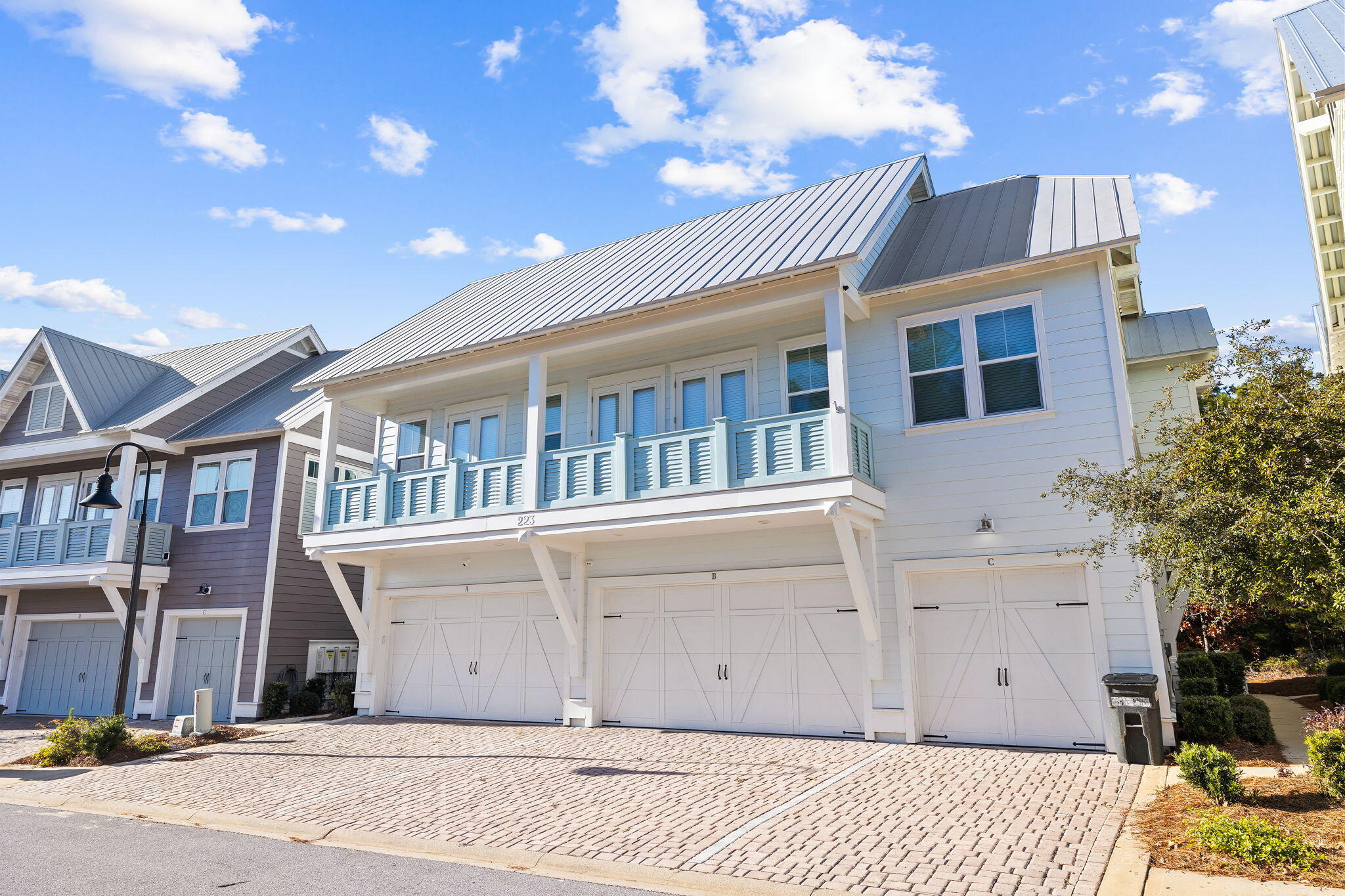 223 Milestone Dr Inlet Beach, Unit B Inlet Beach, FL 32461 - Photo 49 of 58 a view of a house with a backyard