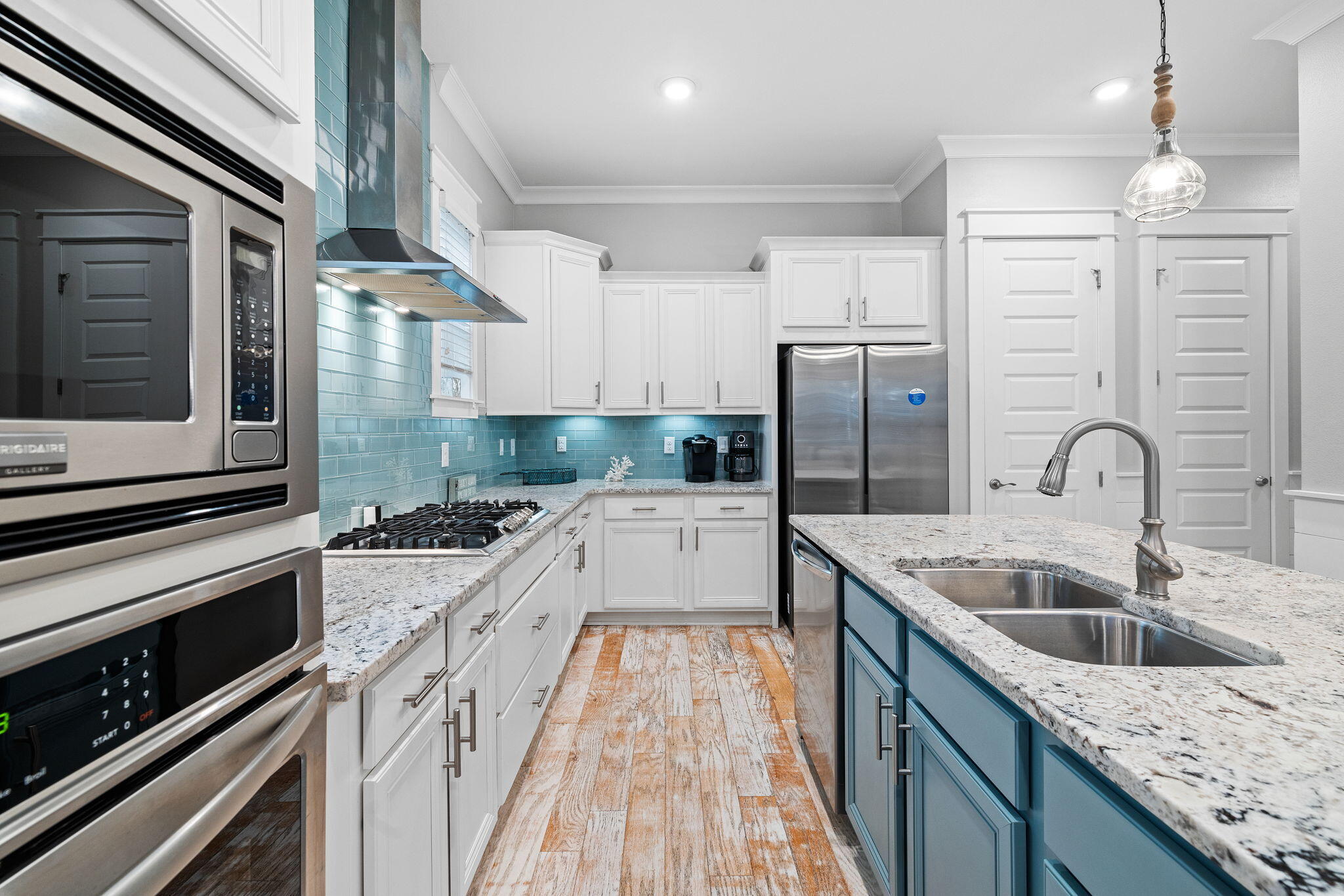 223 Milestone Dr Inlet Beach, Unit B Inlet Beach, FL 32461 - Photo 8 of 58 a kitchen with granite countertop a sink stainless steel appliances and cabinets