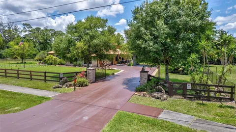 $1,095,000 | 13664 60th Street North, West Palm Beach, FL 33411