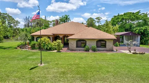 $1,095,000 | 13664 60th Street North, West Palm Beach, FL 33411