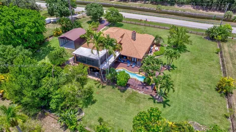 $1,095,000 | 13664 60th Street North, West Palm Beach, FL 33411