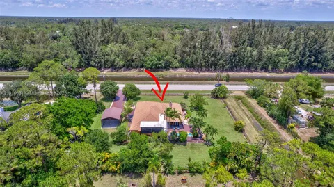 $1,095,000 | 13664 60th Street North, West Palm Beach, FL 33411