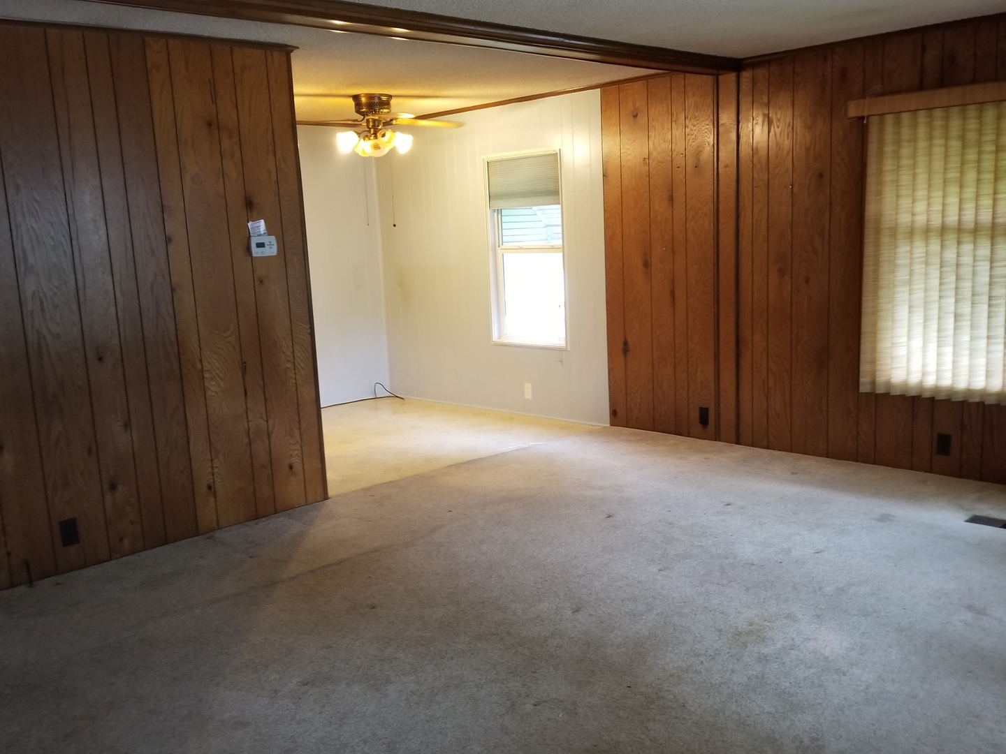 259 Parkwood Road Elgin, IL 60123 - Photo 5 of 18 an empty room with windows and closet