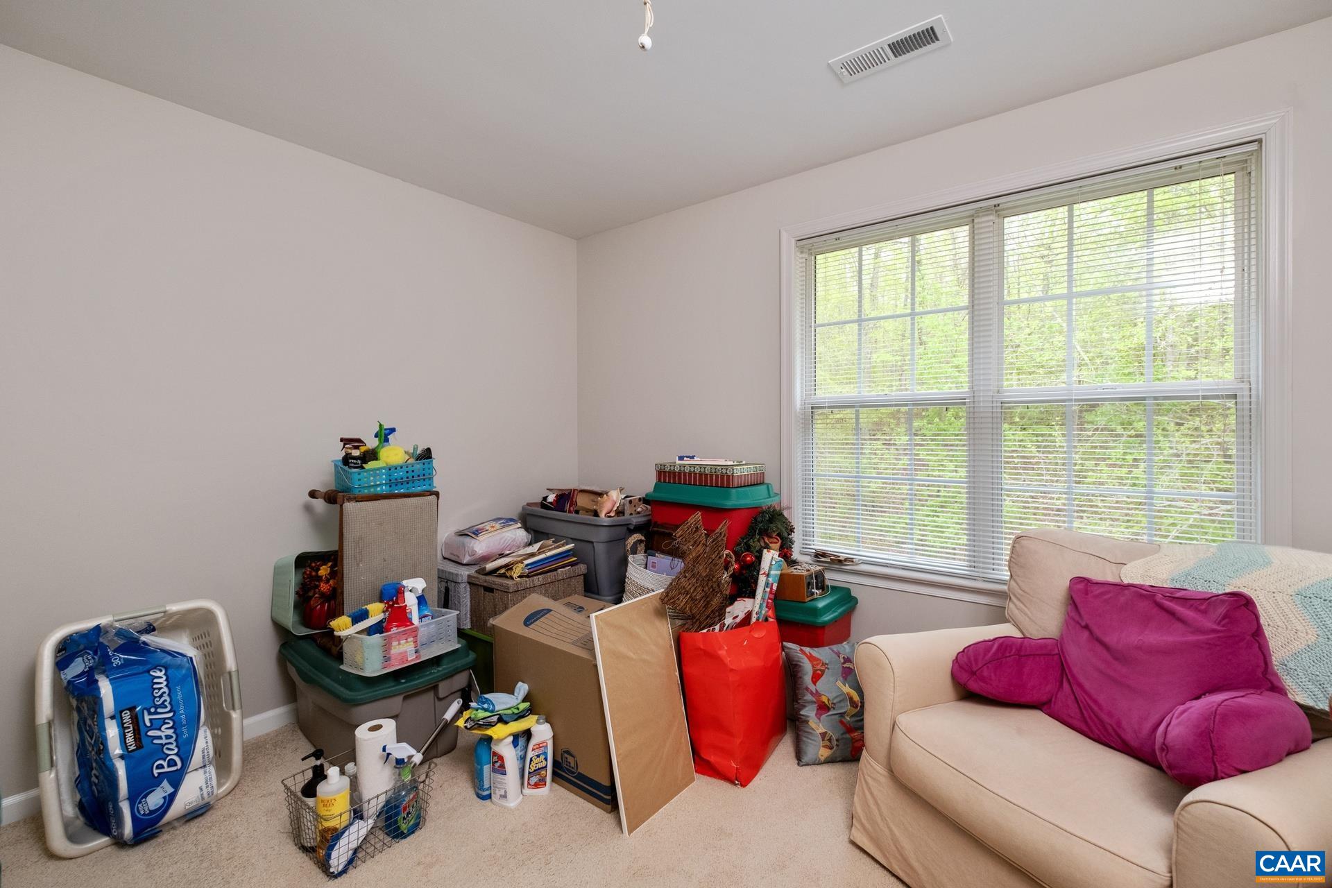 2598 Ravenscroft Way Charlottesville, VA 22911 - Photo 17 of 17 a living room with furniture toys and a window