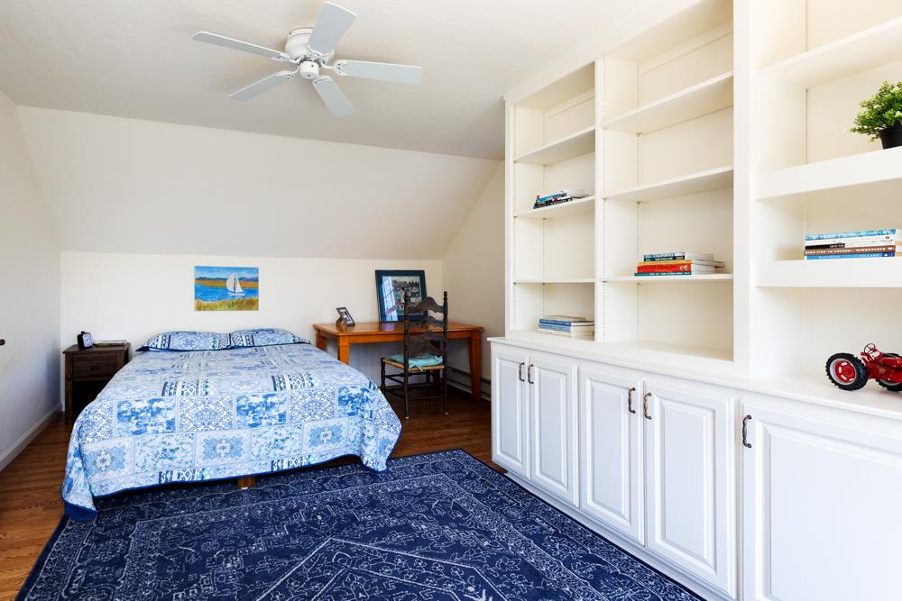 223 Nehf Lane Soquel, CA 95073 - Photo 19 of 34 a bedroom with a bed and cabinets