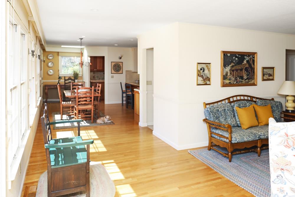 223 Nehf Lane Soquel, CA 95073 - Photo 4 of 34 a living room with furniture a wooden floor and next to a window
