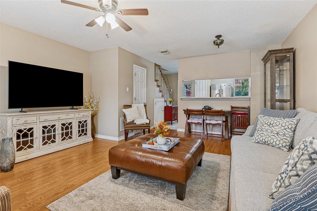 22 Abbey Road Euless, TX 76039 - Photo 4 of 23 Open concept-Wood flooring, half bathroom