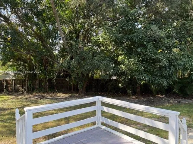 a view of backyard with green space