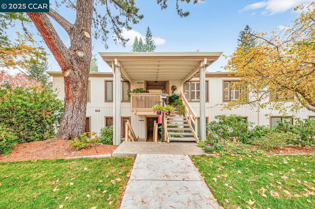 1400 Ptarmigan Drive, Unit 2 Walnut Creek, CA 94595 - Photo 2 of 44 a view of a house with a yard