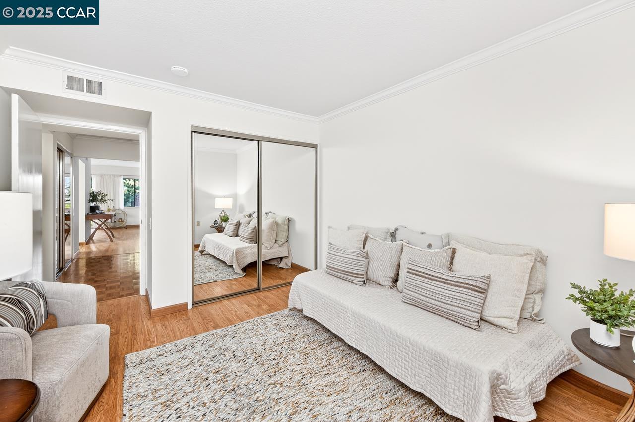 1400 Ptarmigan Drive, Unit 2 Walnut Creek, CA 94595 - Photo 23 of 44 a living room with furniture and a couch