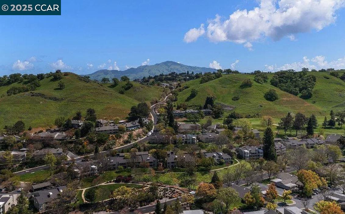 1400 Ptarmigan Drive, Unit 2 Walnut Creek, CA 94595 - Photo 34 of 44 a view of a city with sunset view