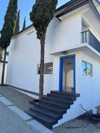 a front view of a house with entryway