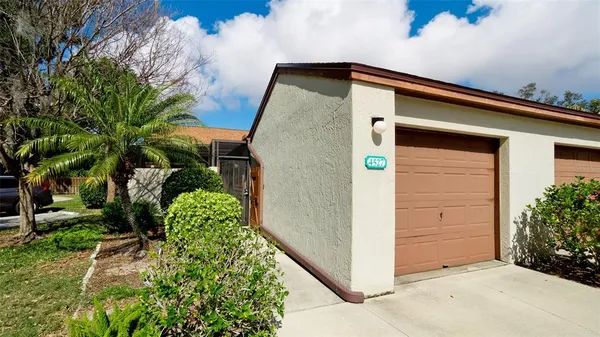 a front view of a house with a garage