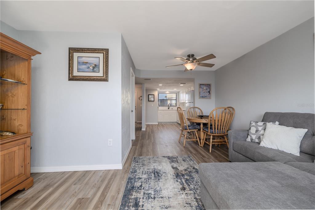 4786 South Atlantic Avenue, Unit 4B Ponce Inlet, FL 32127 - Photo 7 of 22 a living room with furniture and a table