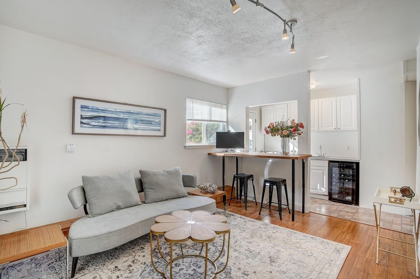 274 Hillside Drive Pacifica, CA 94044 - Photo 24 of 56 a living room with furniture kitchen view and a table