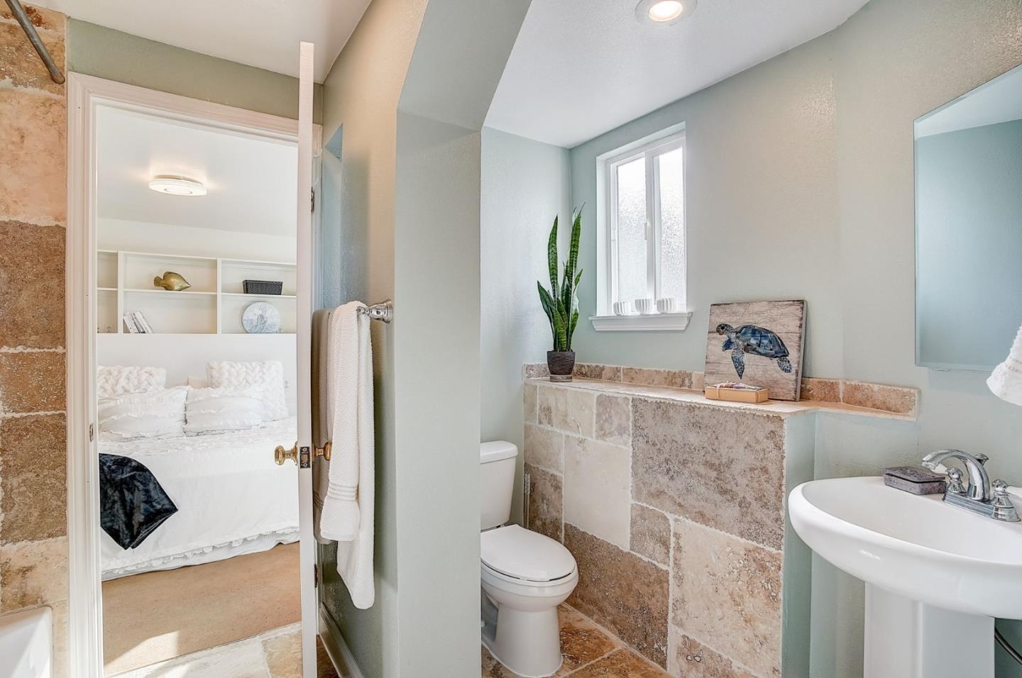 274 Hillside Drive Pacifica, CA 94044 - Photo 26 of 56 a bathroom with a sink toilet and shower