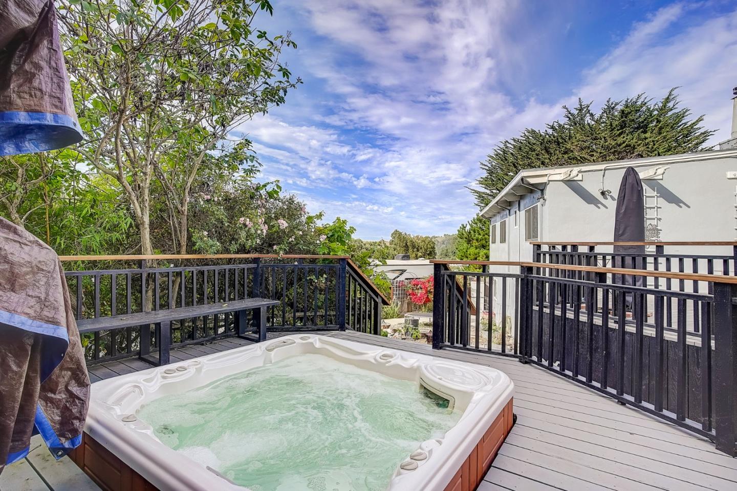 274 Hillside Drive Pacifica, CA 94044 - Photo 37 of 56 a view of roof deck with wooden floor and fence