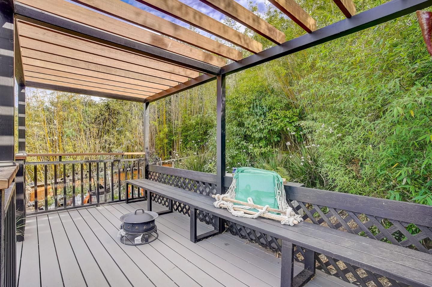 274 Hillside Drive Pacifica, CA 94044 - Photo 40 of 56 a roof deck with wooden floor and fence