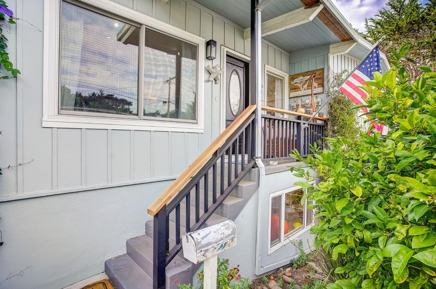 274 Hillside Drive Pacifica, CA 94044 - Photo 6 of 56 a view of entryway with a flower garden