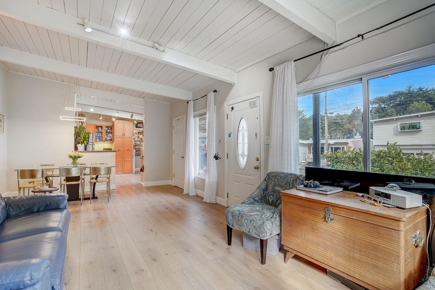 274 Hillside Drive Pacifica, CA 94044 - Photo 7 of 56 a living room with furniture and a large window