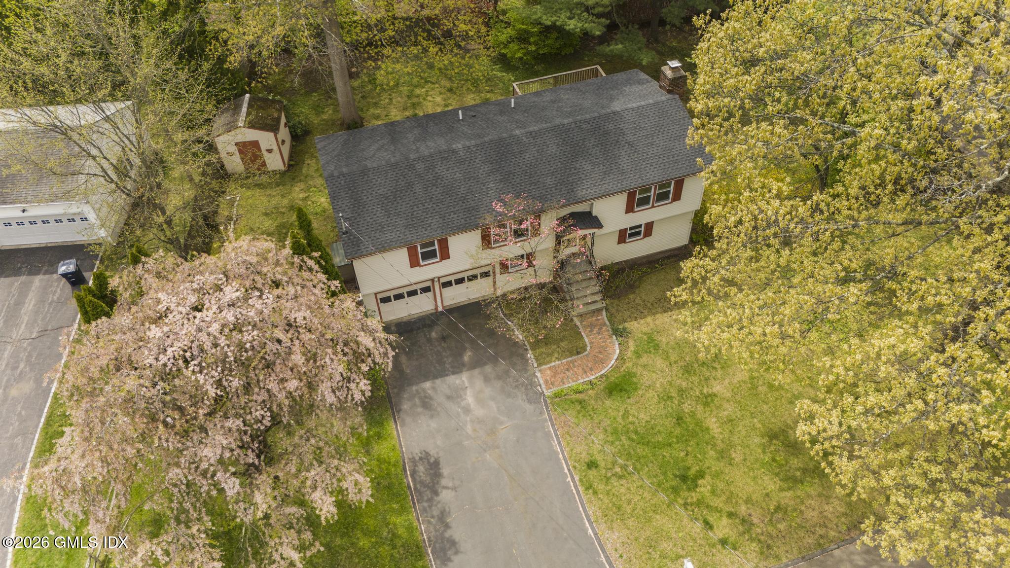 22 Carrona Drive Riverside, CT 06878 - Photo 23 of 26 aerial view of a house with a yard and large tree