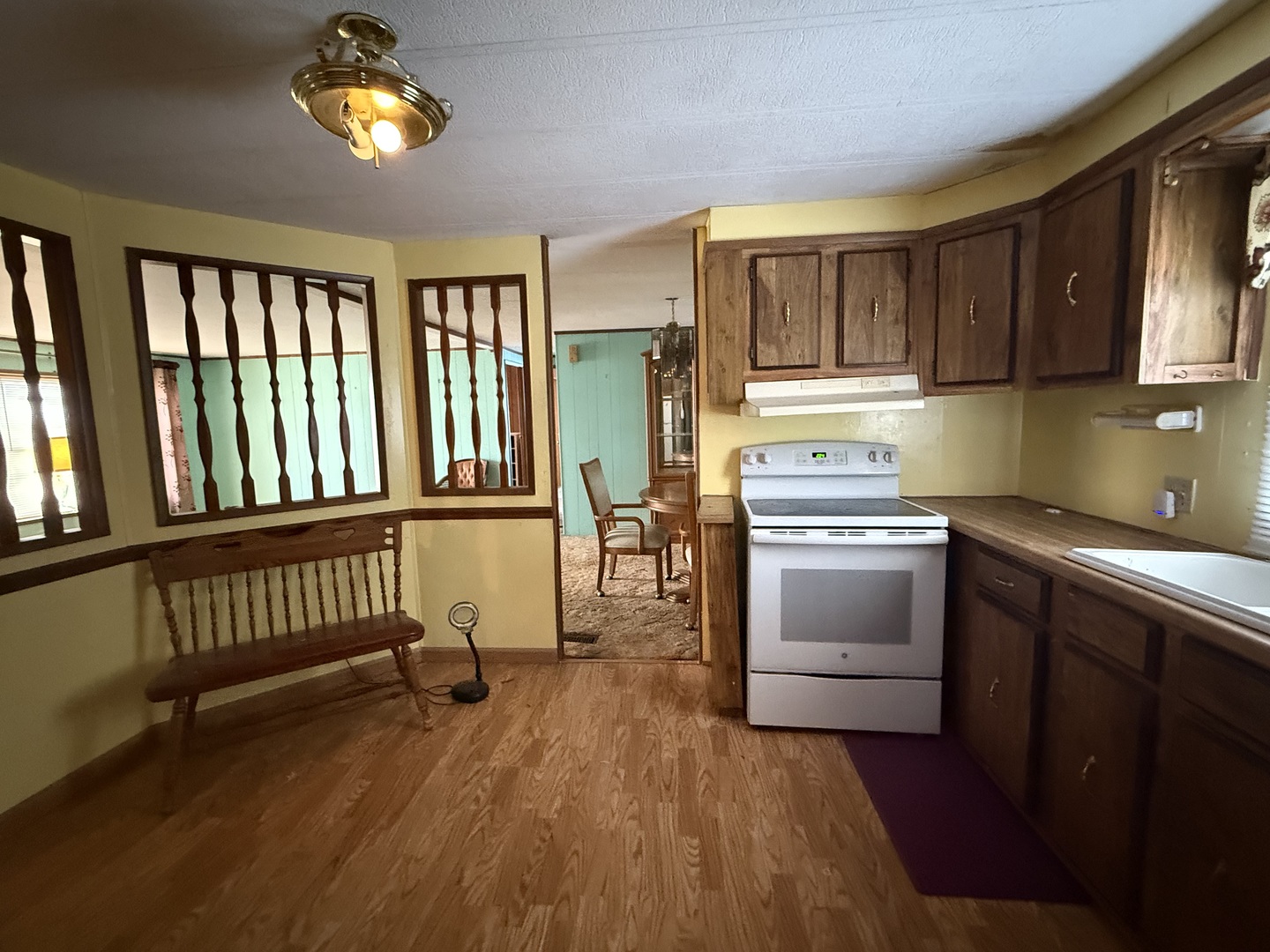 278 Blackthorn Road Matteson, IL 60443 - Photo 2 of 20 a kitchen with a refrigerator and a stove top oven