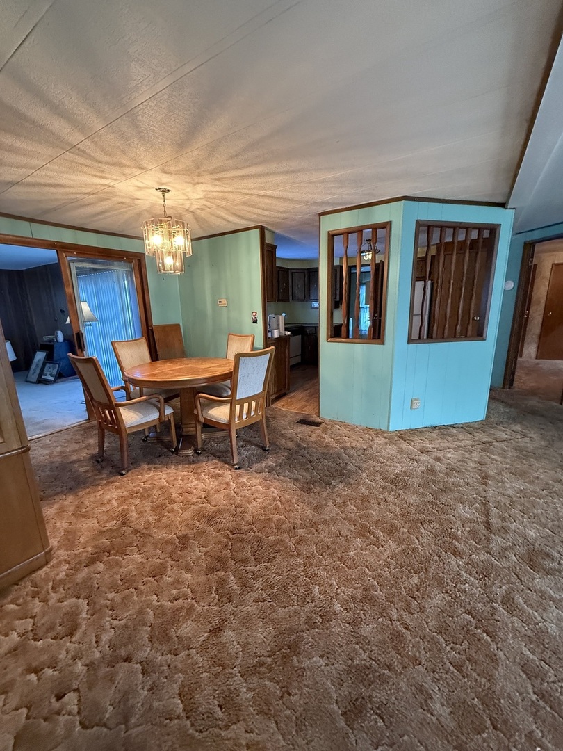 278 Blackthorn Road Matteson, IL 60443 - Photo 9 of 20 a view of a livingroom with furniture and window