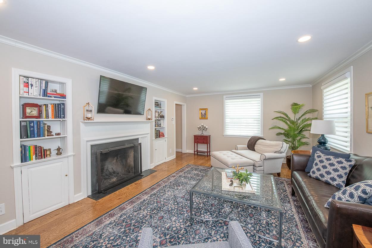5 Chestnut Lane Wayne, PA 19087 - Photo 3 of 29 Wood-burning fireplace and built-in bookshelves
