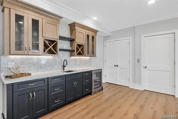 a spacious bathroom with a double vanity sink and a mirror