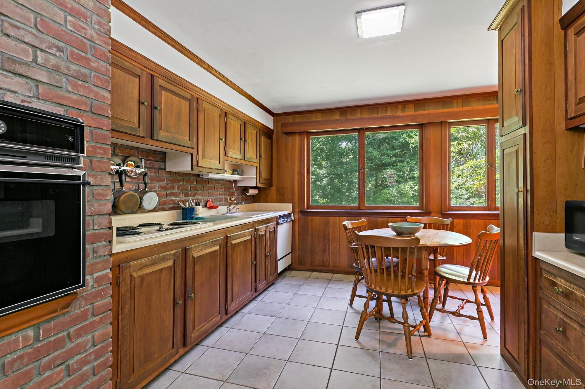 538 Croton Heights Road Yorktown Heights, NY 10598 - Photo 10 of 24 Working area of the eat in kitchen with gorgeous views to the backyard grounds.
