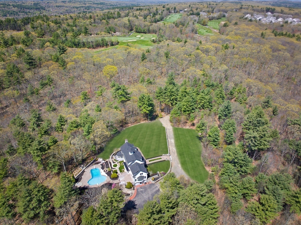175 Pleasant Street Upton, MA 01568 - Photo 4 of 39 an aerial view of a house with a yard