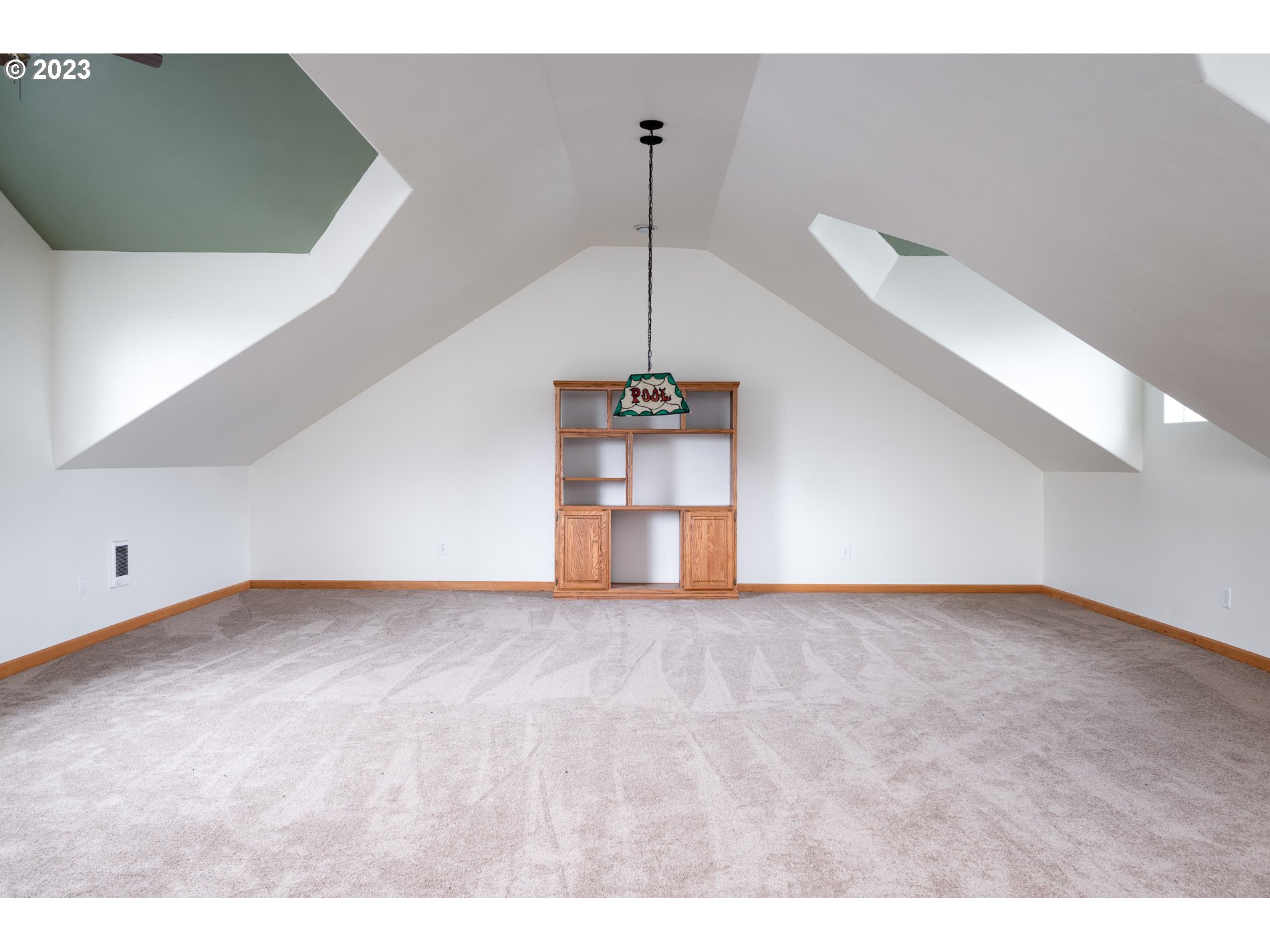 27730 Southwest Laurel Road Hillsboro, OR 97123 - Photo 27 of 32 a view of empty room with wooden floor