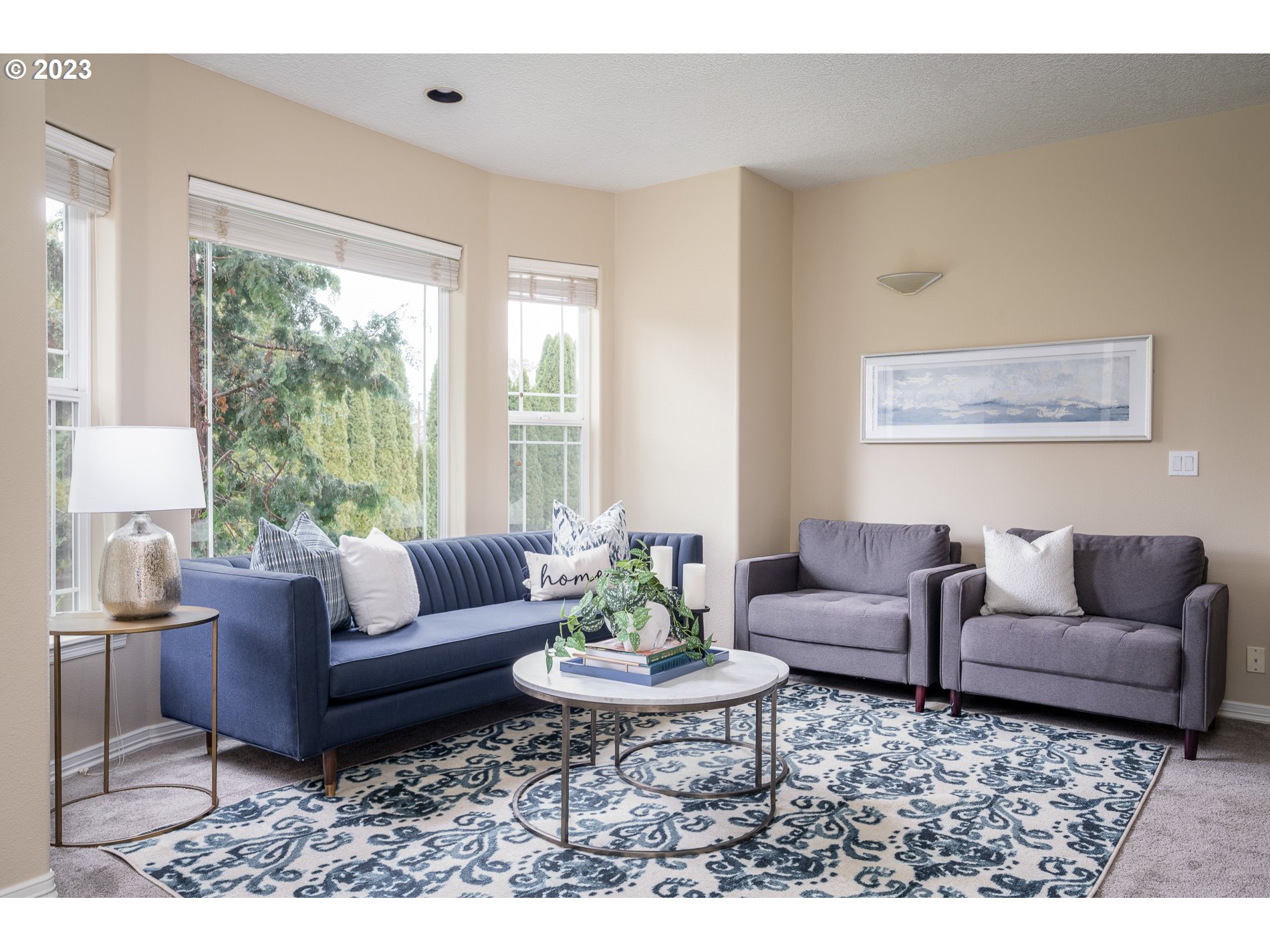 27730 Southwest Laurel Road Hillsboro, OR 97123 - Photo 7 of 32 a living room with furniture and a large window