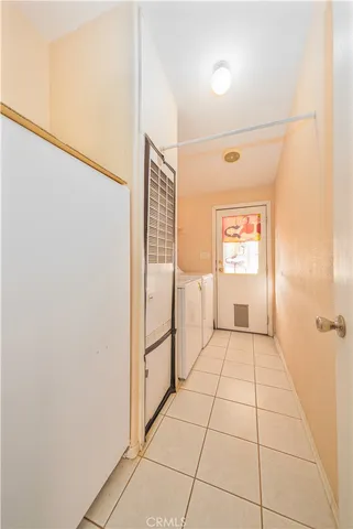 a view of a hallway with a window